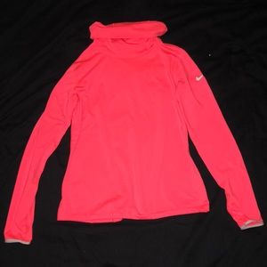 A hot pink dri-fit nike sports  jacket